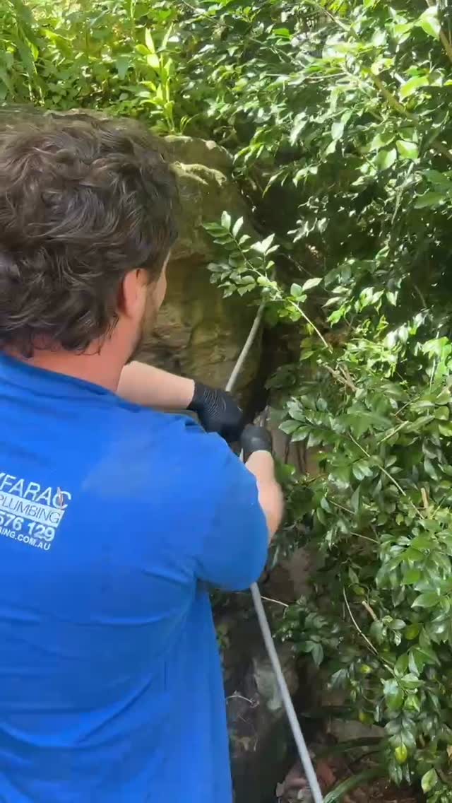 AFP plumber at work on pipe relining job, North Shore